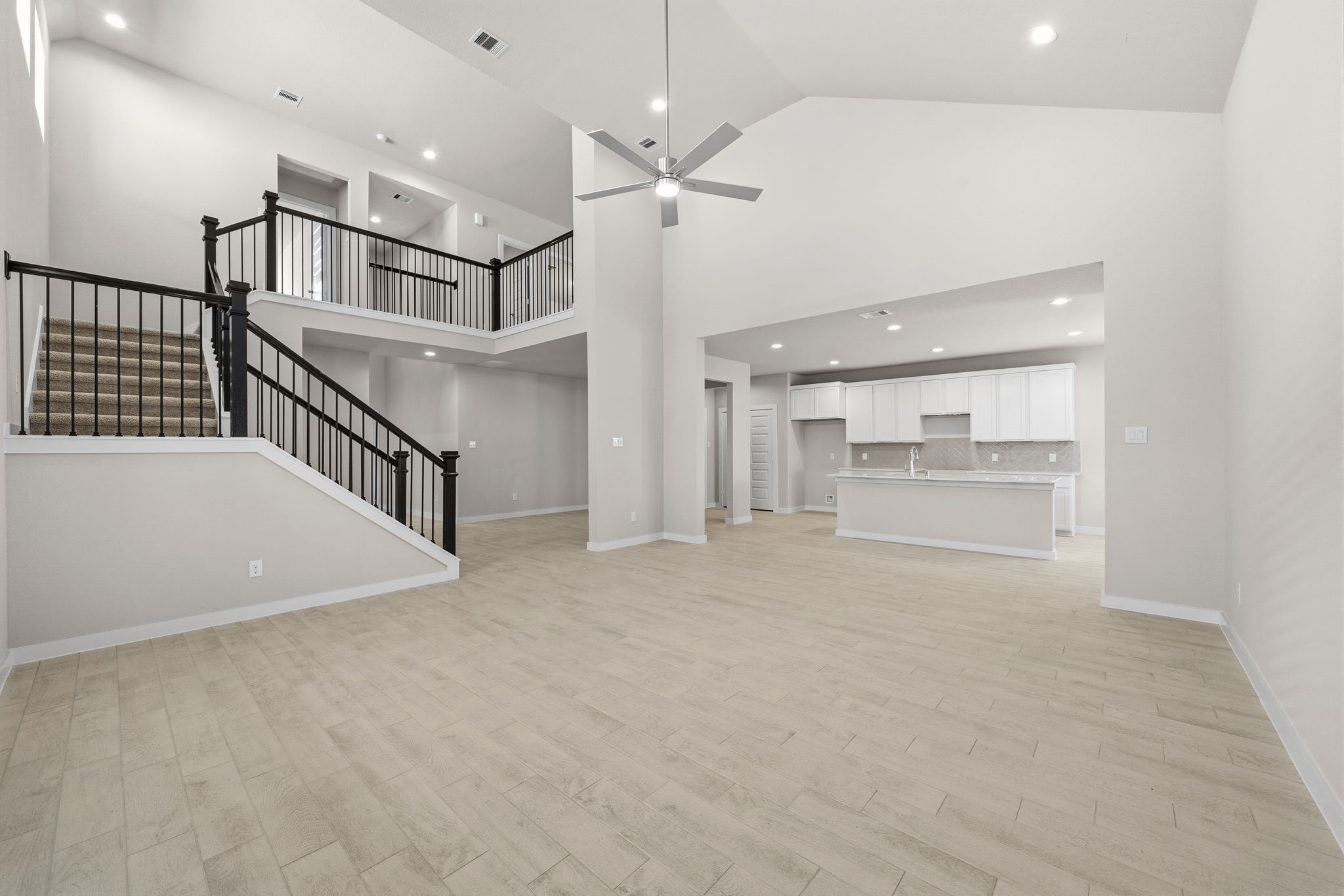 2567 Forest Cedar Lane Conroe, TX 77301 - Photo 13 of 40 a view of a hallway with staircase
