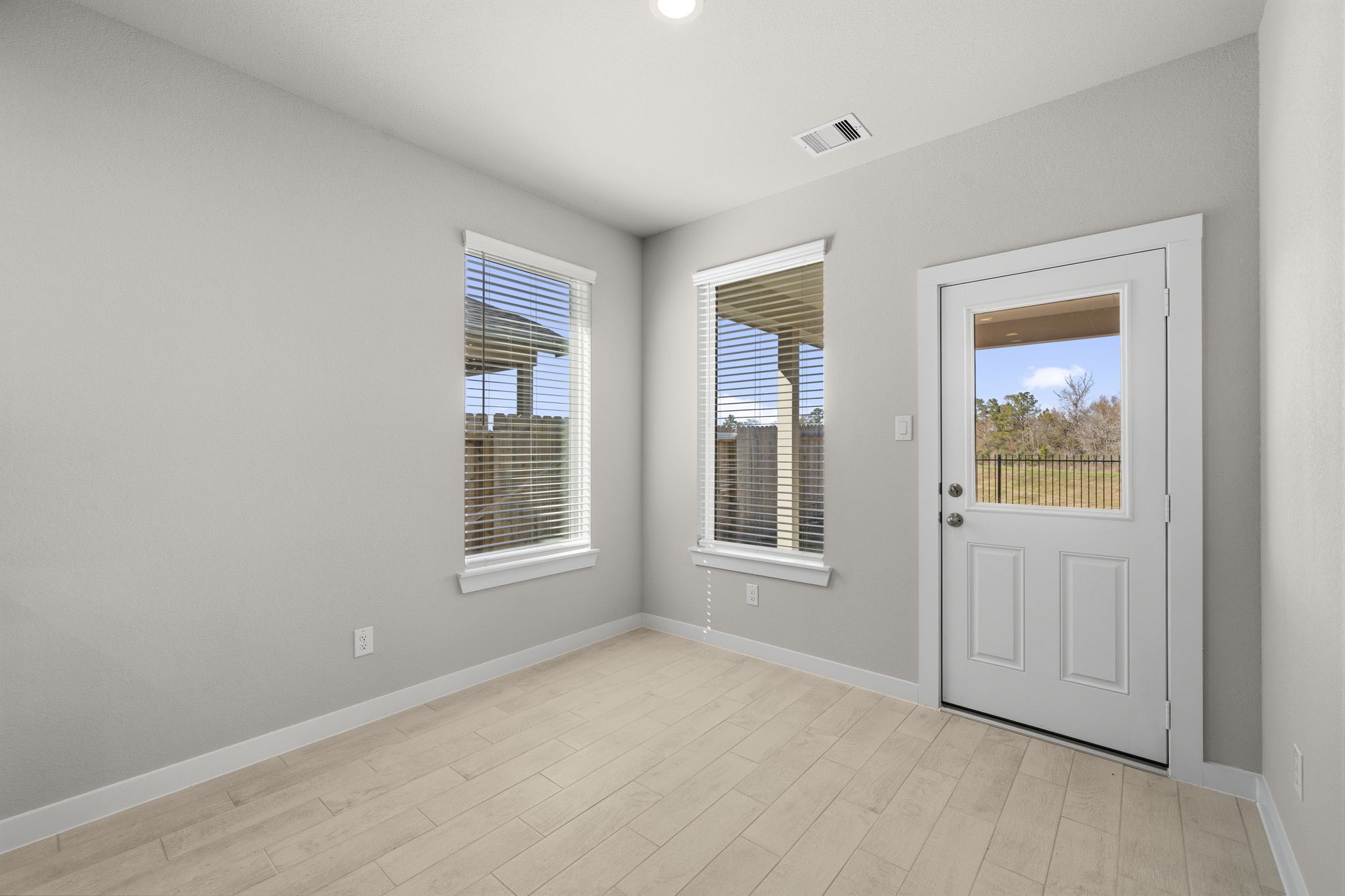 2567 Forest Cedar Lane Conroe, TX 77301 - Photo 15 of 40 a view of an empty room with a window