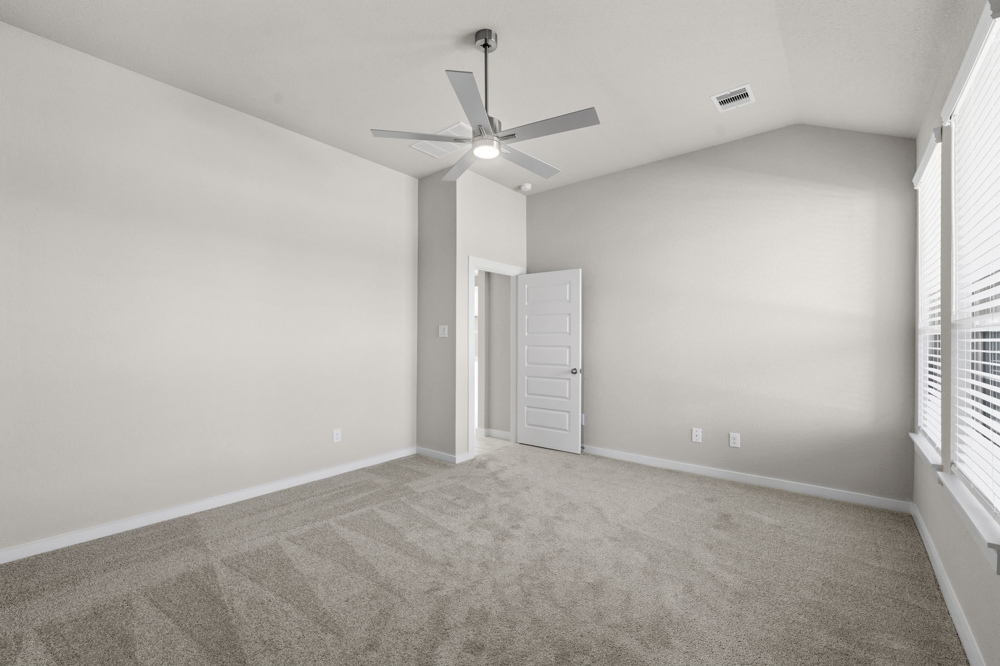 2567 Forest Cedar Lane Conroe, TX 77301 - Photo 17 of 40 a view of an empty room with a window