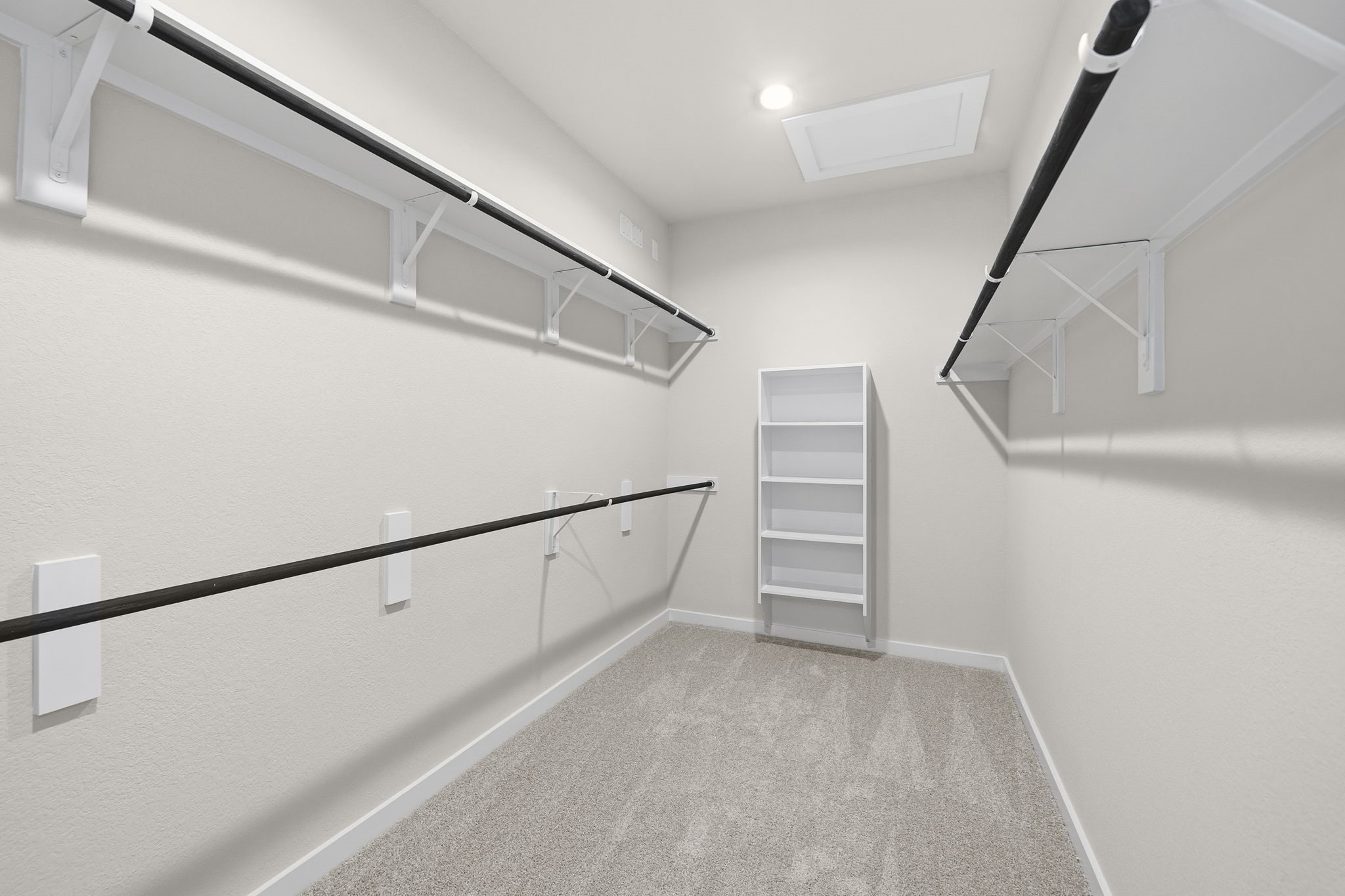 2567 Forest Cedar Lane Conroe, TX 77301 - Photo 22 of 40 a view of walk in closet with empty racks