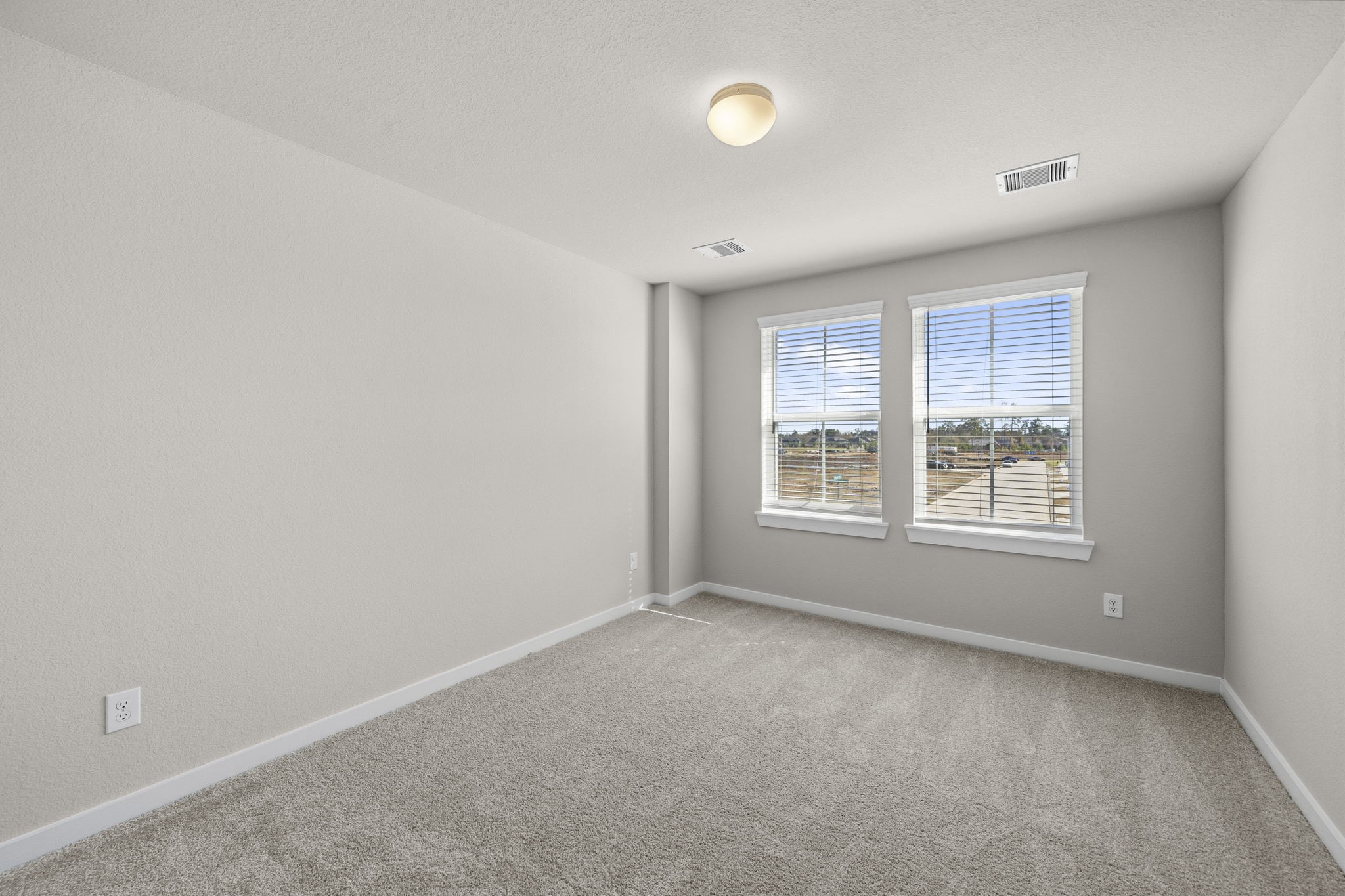 2567 Forest Cedar Lane Conroe, TX 77301 - Photo 24 of 40 an empty room with a window