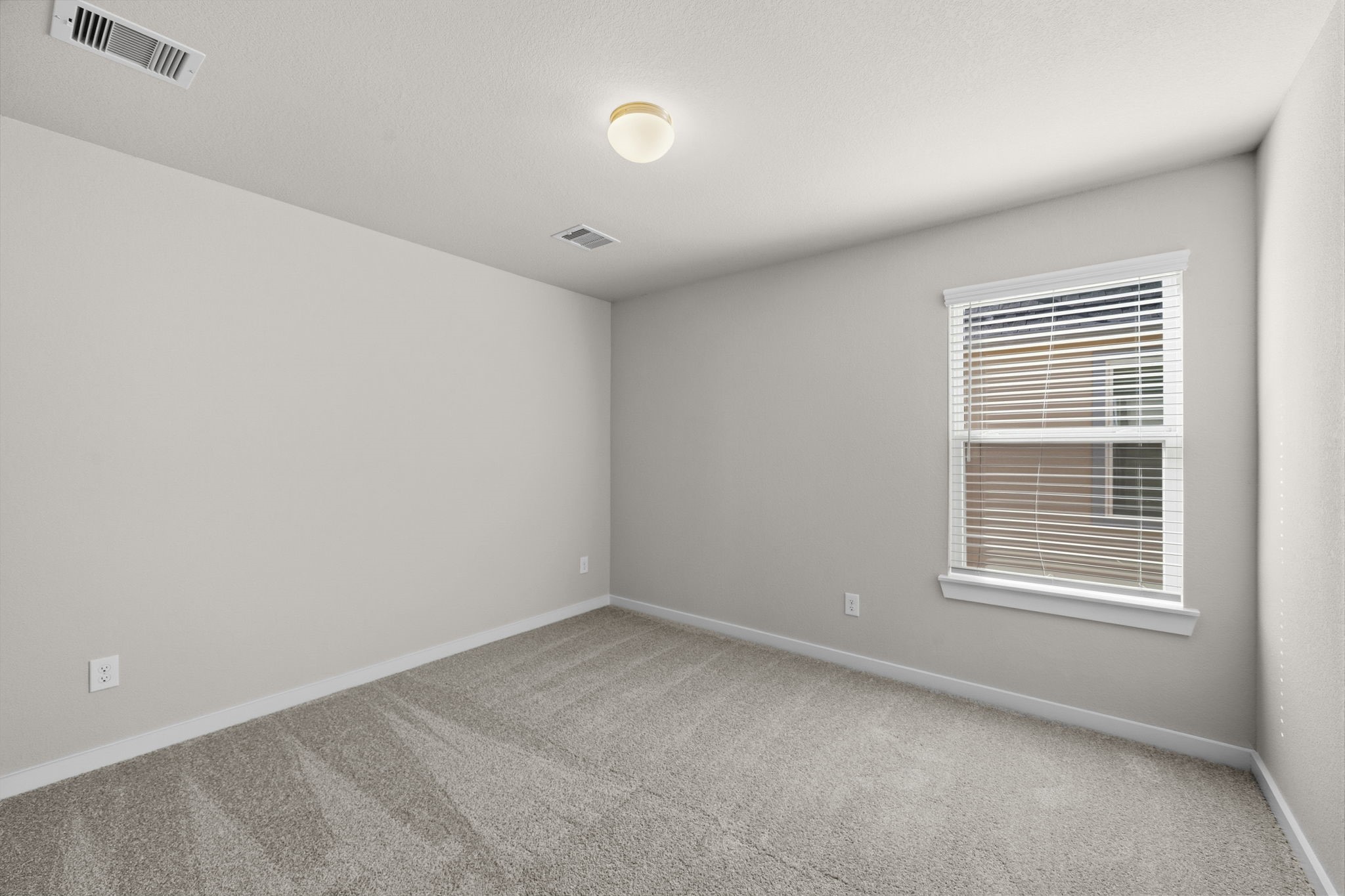 2567 Forest Cedar Lane Conroe, TX 77301 - Photo 28 of 40 a view of an empty room with a window