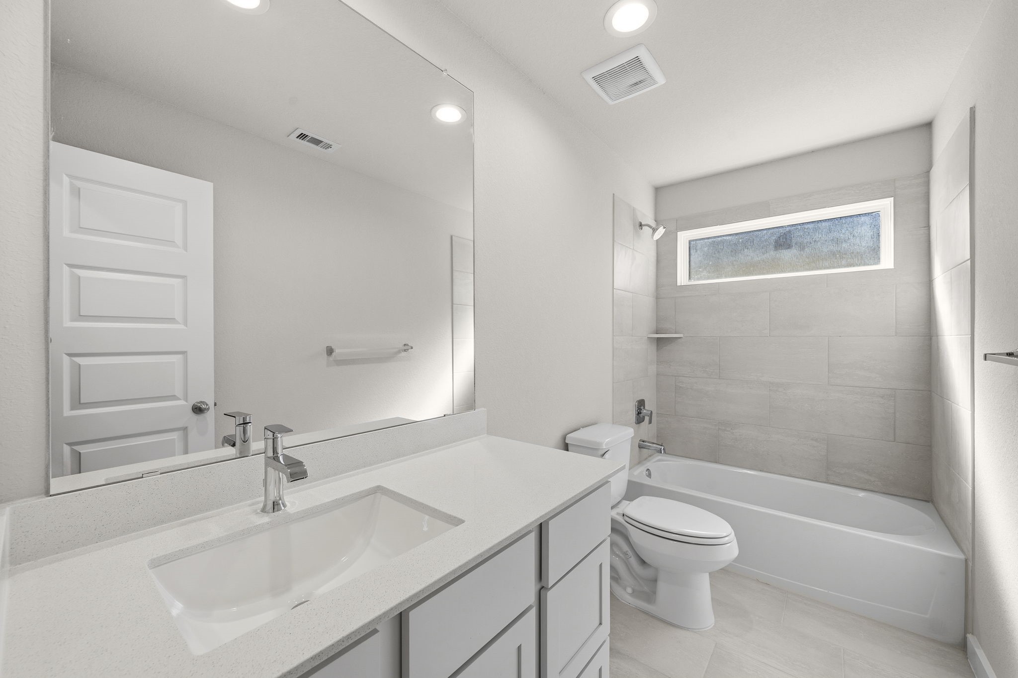 2567 Forest Cedar Lane Conroe, TX 77301 - Photo 30 of 40 a bathroom with a sink a toilet and shower