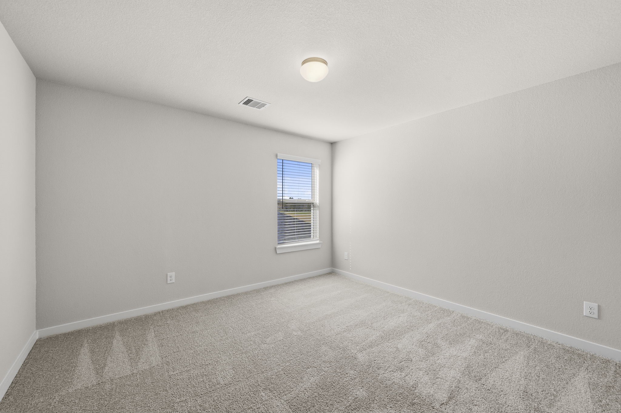 2567 Forest Cedar Lane Conroe, TX 77301 - Photo 31 of 40 a view of an empty room with a window
