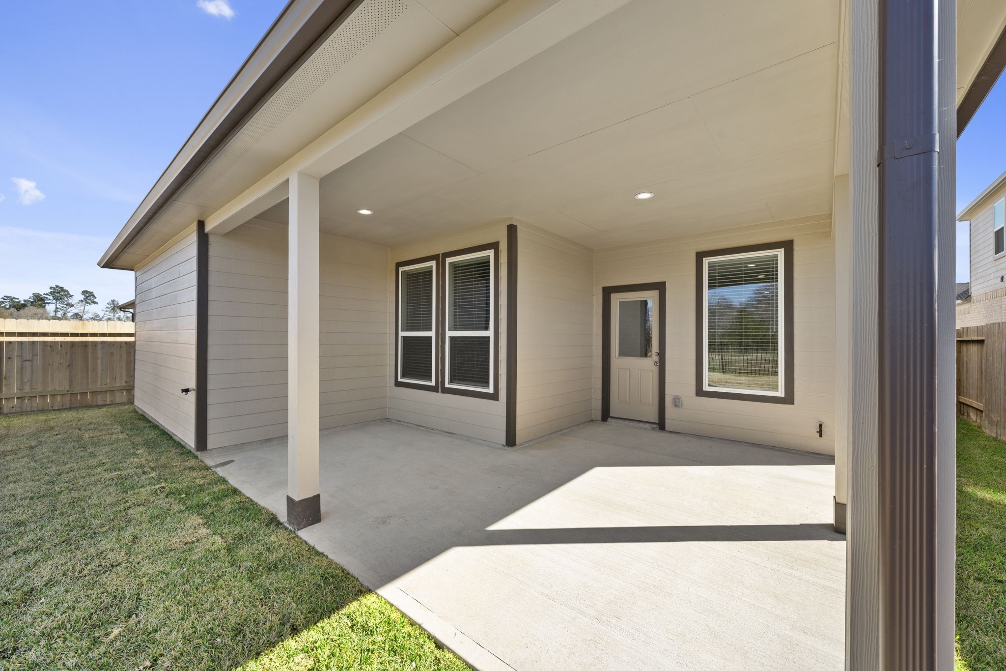 2567 Forest Cedar Lane Conroe, TX 77301 - Photo 35 of 40 a front view of house with yard