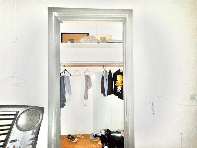 a bathroom with a shower and mirror