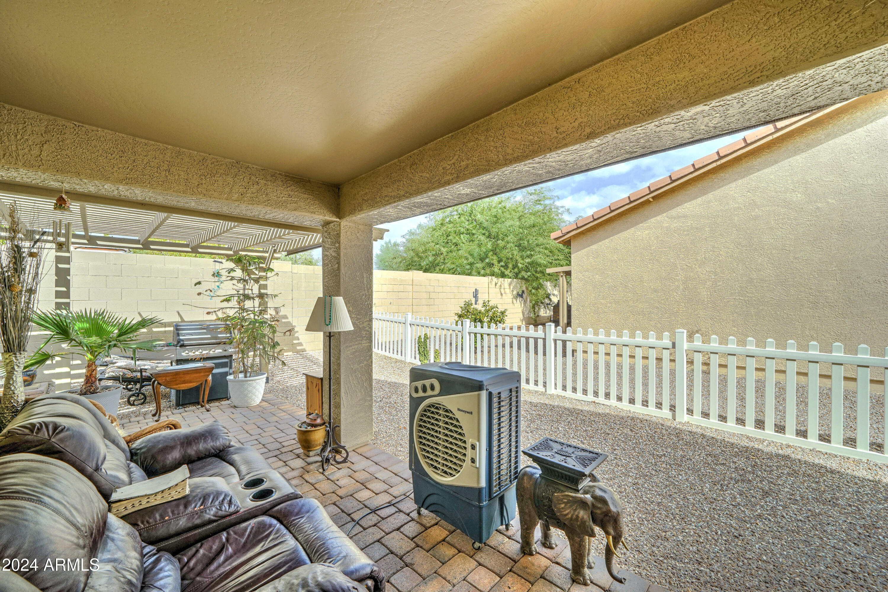 2101 South Meridian Road, Unit 157 Apache Junction, AZ 85120 - Photo 23 of 51 a living room with furniture and a window