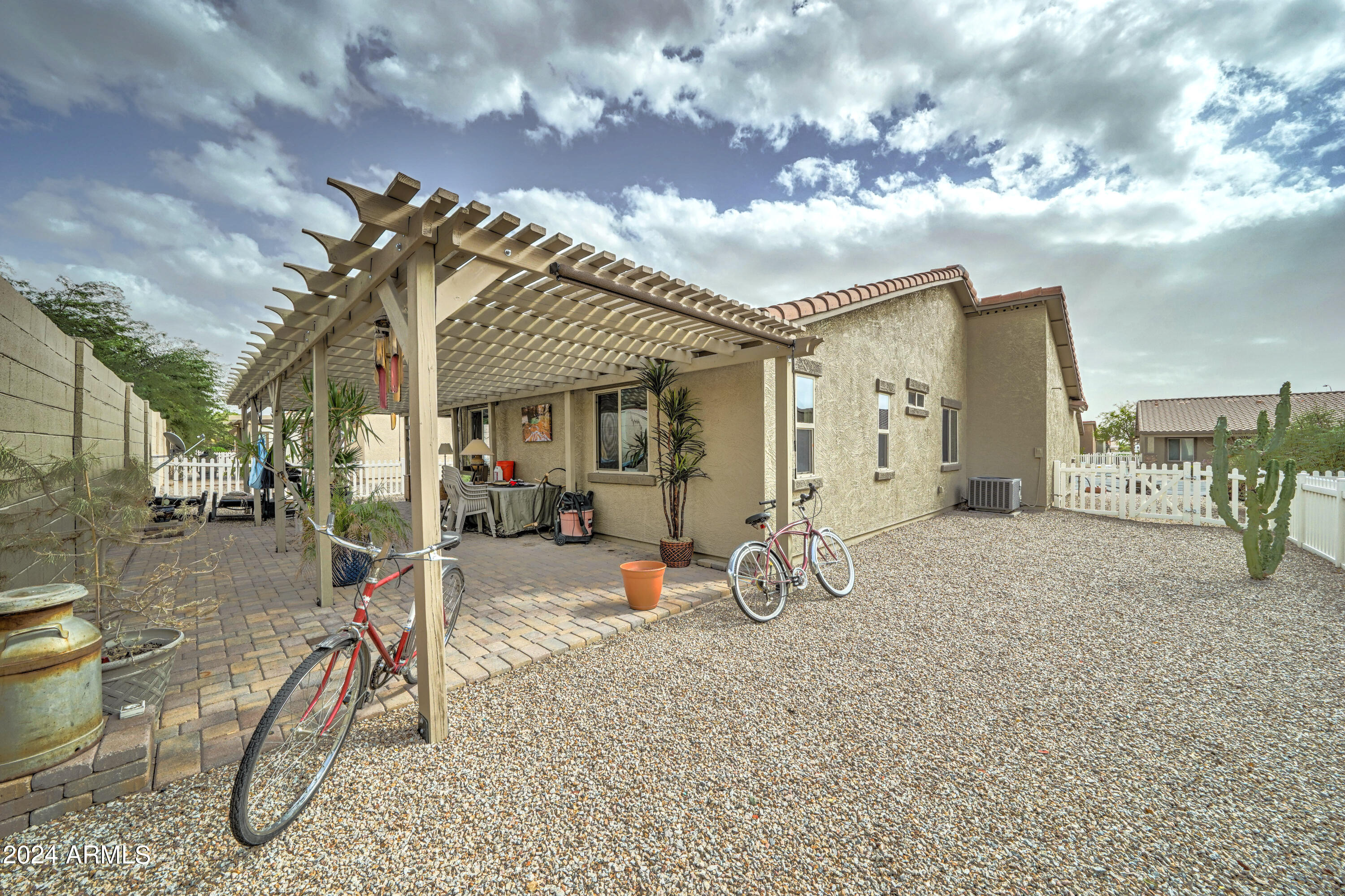 2101 South Meridian Road, Unit 157 Apache Junction, AZ 85120 - Photo 26 of 51 a view of a house with a patio