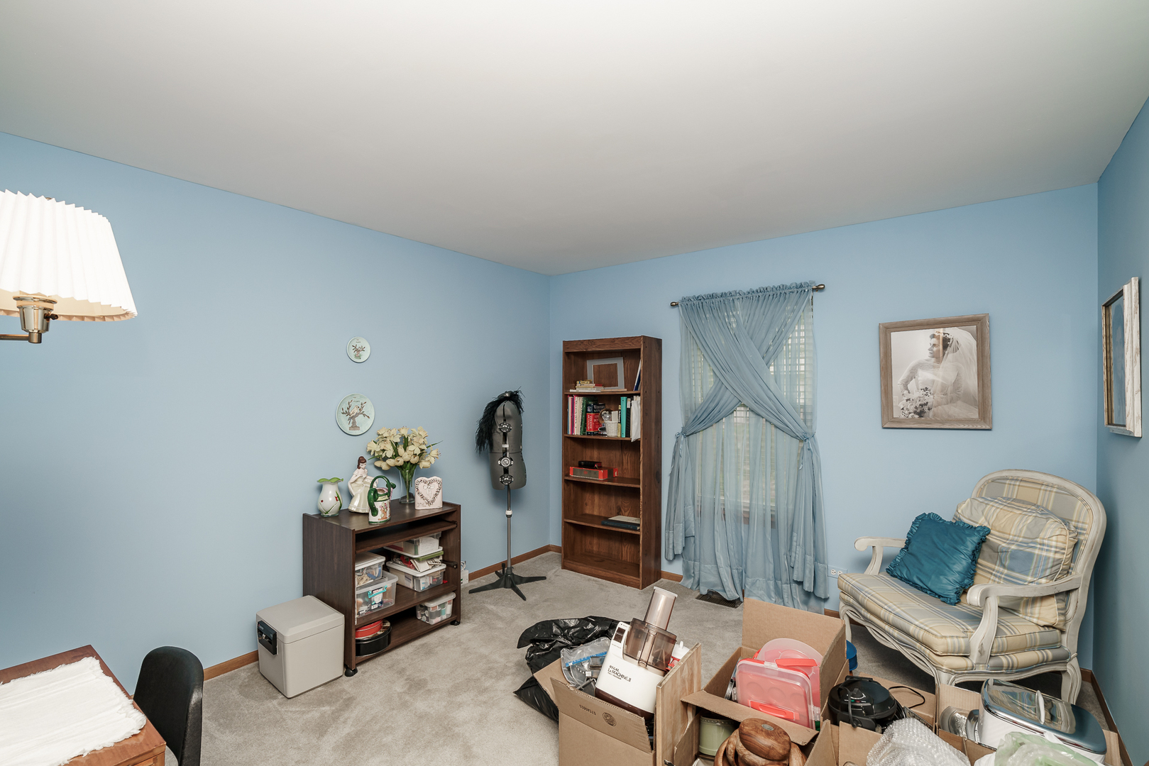 309 Spring Valley Way Round Lake, IL 60073 - Photo 21 of 26 a living room with furniture a rug and a wall painting