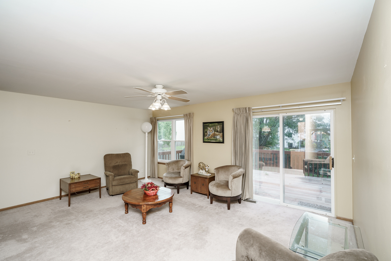 309 Spring Valley Way Round Lake, IL 60073 - Photo 7 of 26 a living room with furniture and a large window