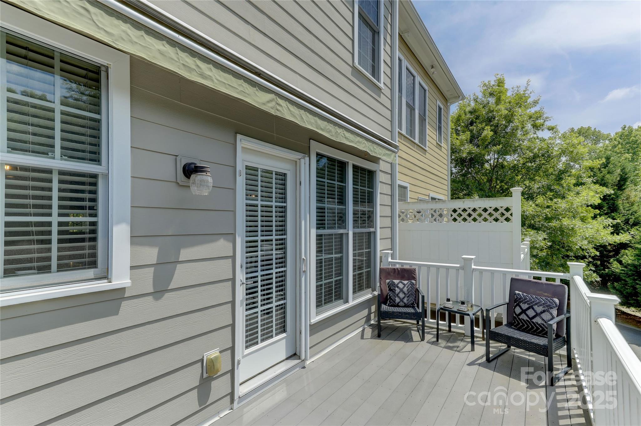 1132 Drayton Court Fort Mill, SC 29708 - Photo 22 of 48 a roof deck with table and chairs and potted plants