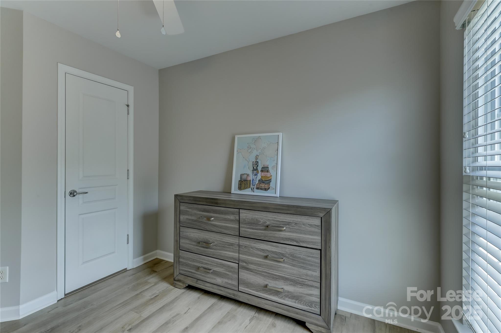 1132 Drayton Court Fort Mill, SC 29708 - Photo 35 of 48 a view of dresser with wooden floor