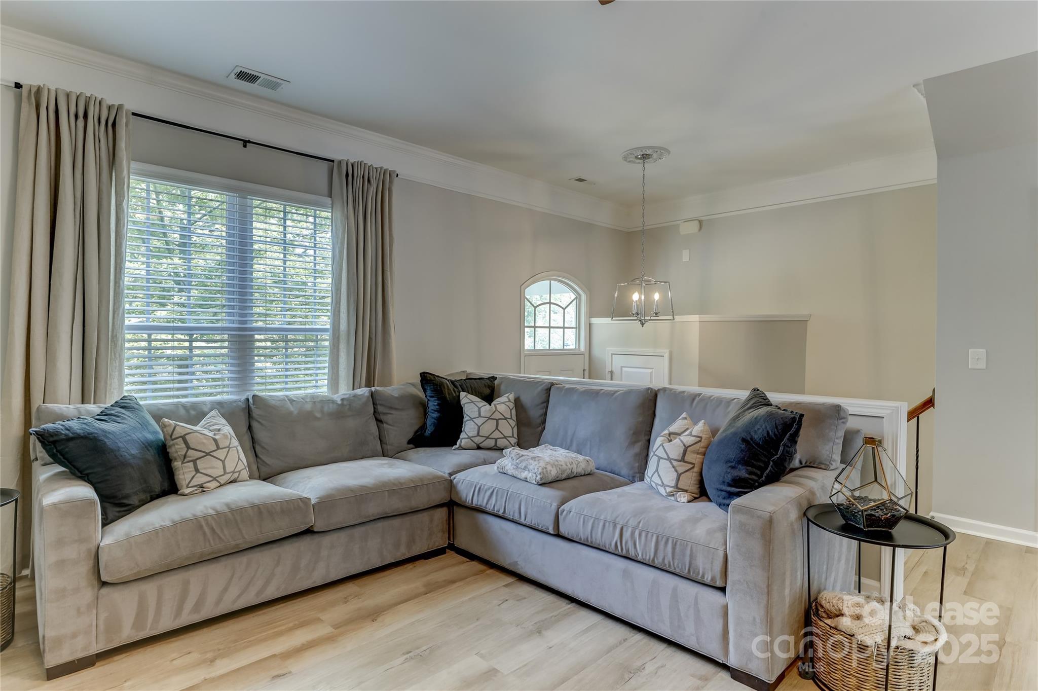1132 Drayton Court Fort Mill, SC 29708 - Photo 7 of 48 a living room with furniture and a large window