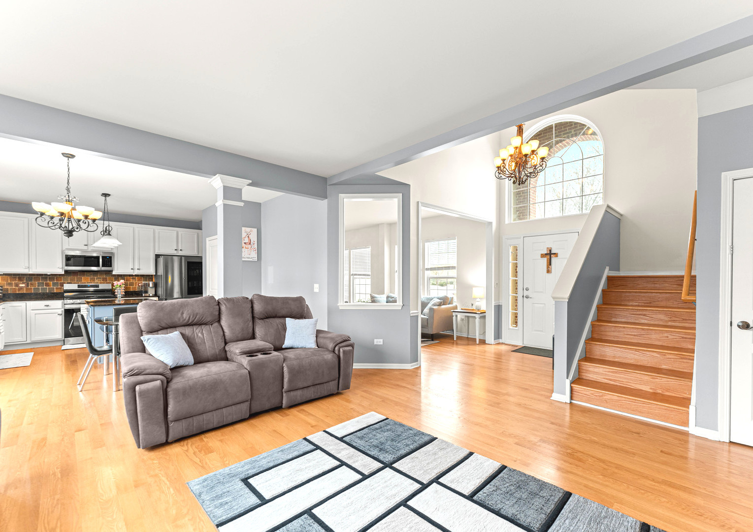 7 Pampas Court Bolingbrook, IL 60490 - Photo 16 of 39 a living room with fireplace furniture and a wooden floor