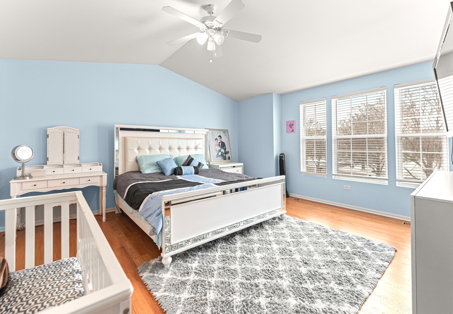 7 Pampas Court Bolingbrook, IL 60490 - Photo 22 of 39 a large white bed sitting in a bedroom next to a window