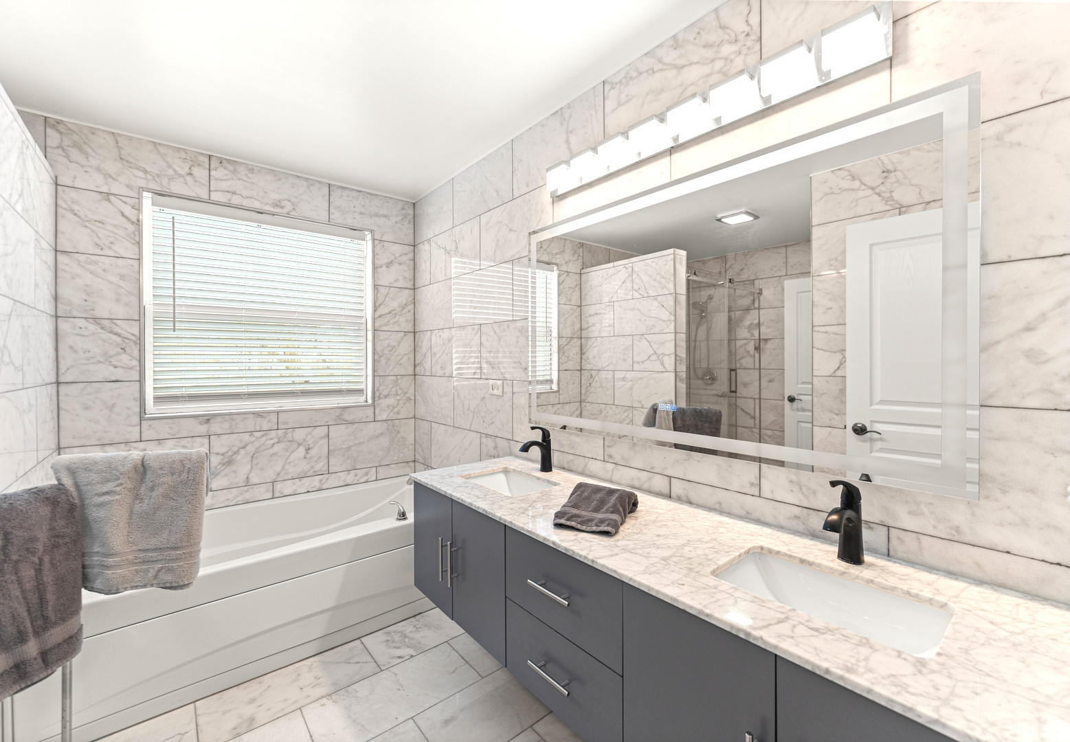 7 Pampas Court Bolingbrook, IL 60490 - Photo 23 of 39 a bathroom with a granite countertop sink and a bathtub