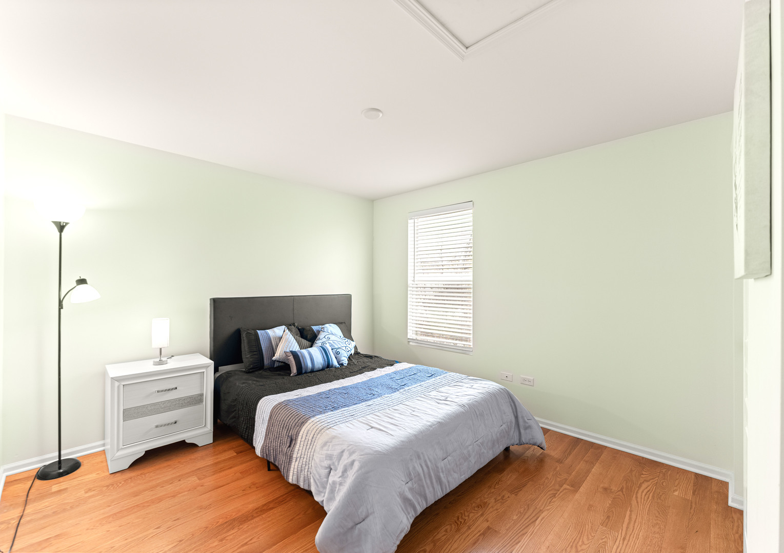 7 Pampas Court Bolingbrook, IL 60490 - Photo 29 of 39 a bedroom with a bed and wooden floor