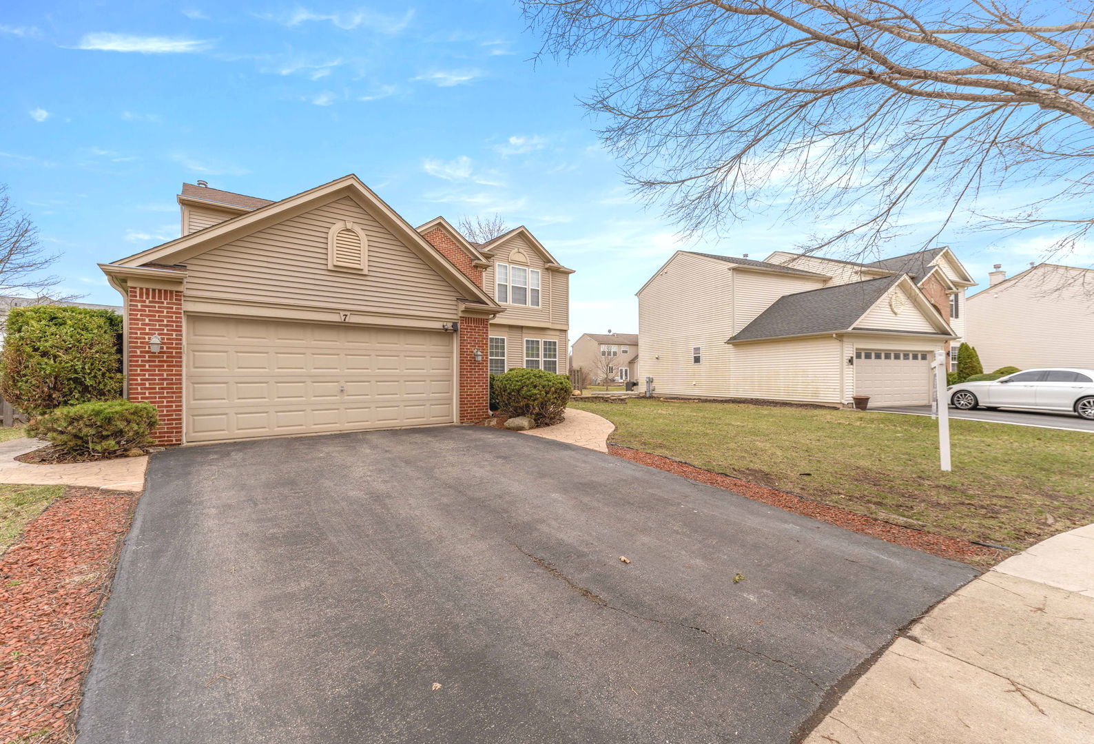 7 Pampas Court Bolingbrook, IL 60490 - Photo 39 of 39 a front view of a house with a yard and garage