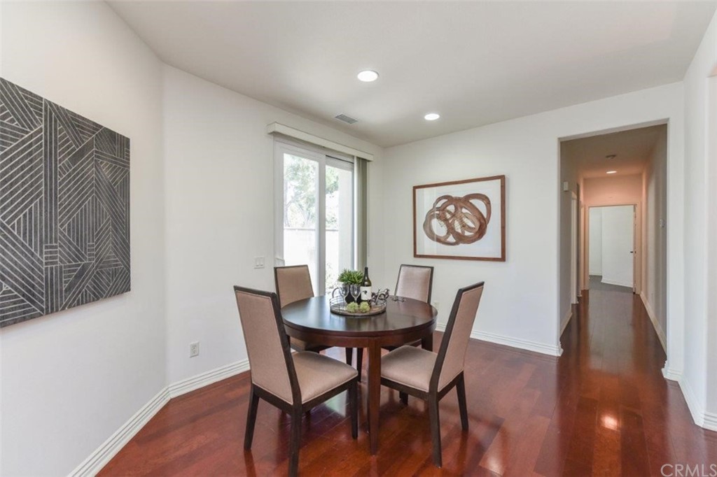 17 Stonegate Irvine, CA 92602 - Photo 28 of 72 a view of a dining room with furniture and wooden floor