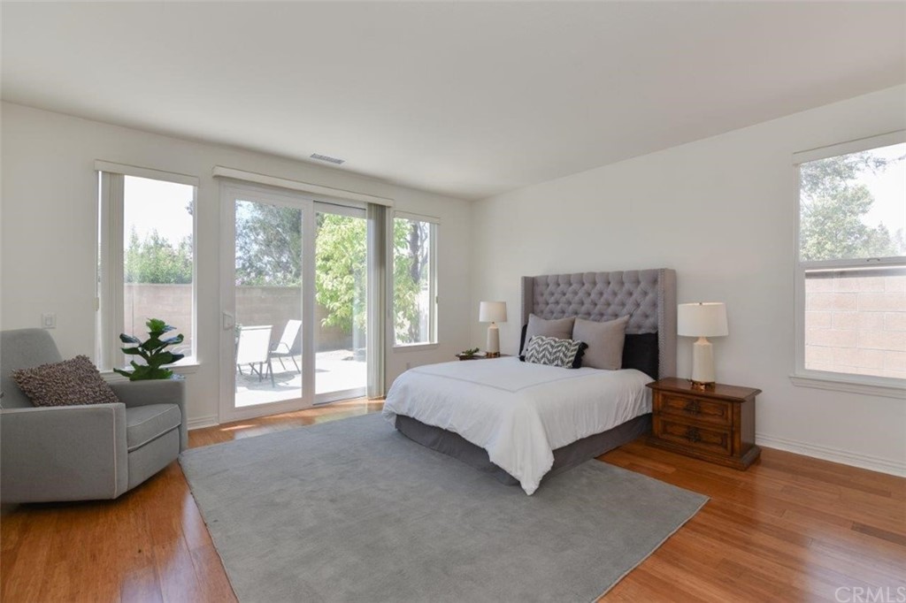 17 Stonegate Irvine, CA 92602 - Photo 38 of 72 a bedroom with a large bed and a large window