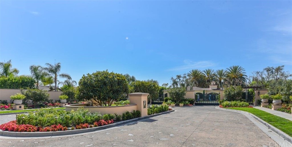 17 Stonegate Irvine, CA 92602 - Photo 5 of 72 a view of a garden with a building in the background