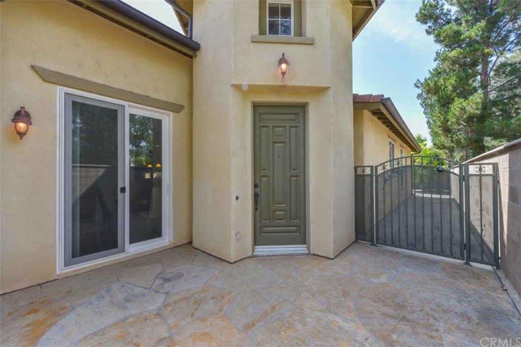 17 Stonegate Irvine, CA 92602 - Photo 56 of 72 an empty room with entrance and windows
