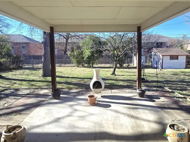 a view of a park with porch and patio