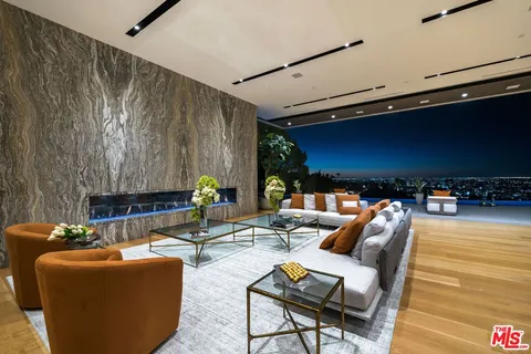 a group of people sitting in a living room