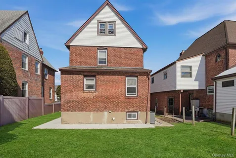 a bedroom with furniture and wooden floor