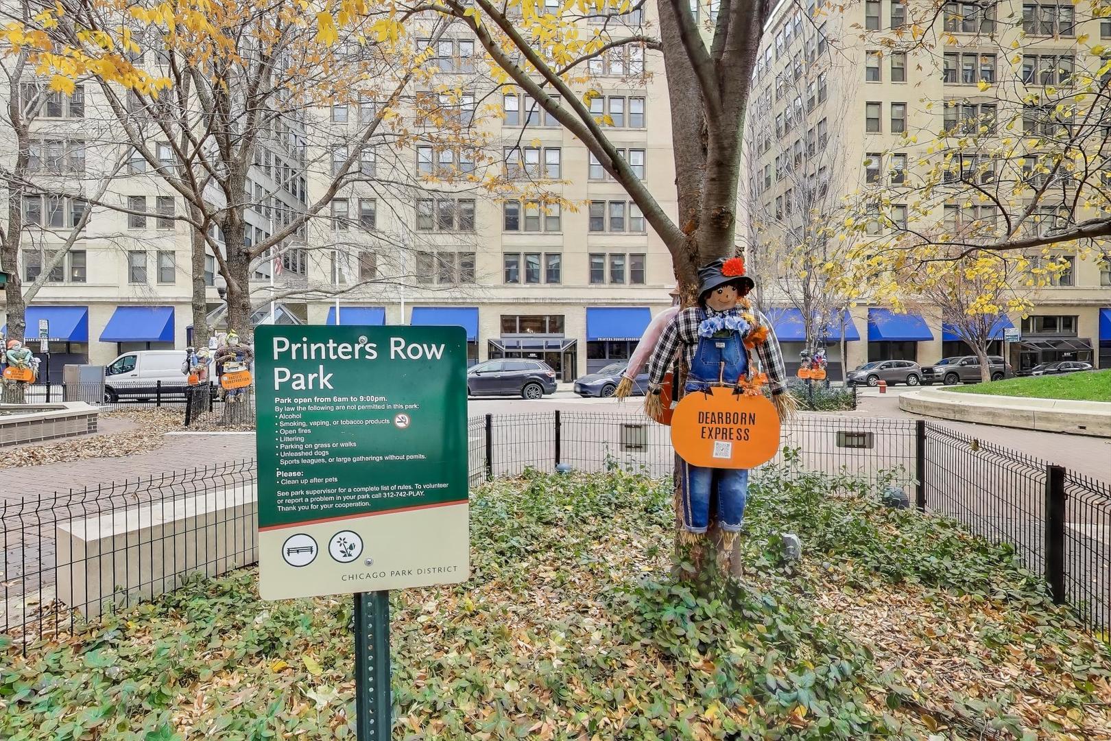 780 South Federal Street, Unit 903 Chicago, IL 60605 - Photo 28 of 31 a front view of a building with parking area