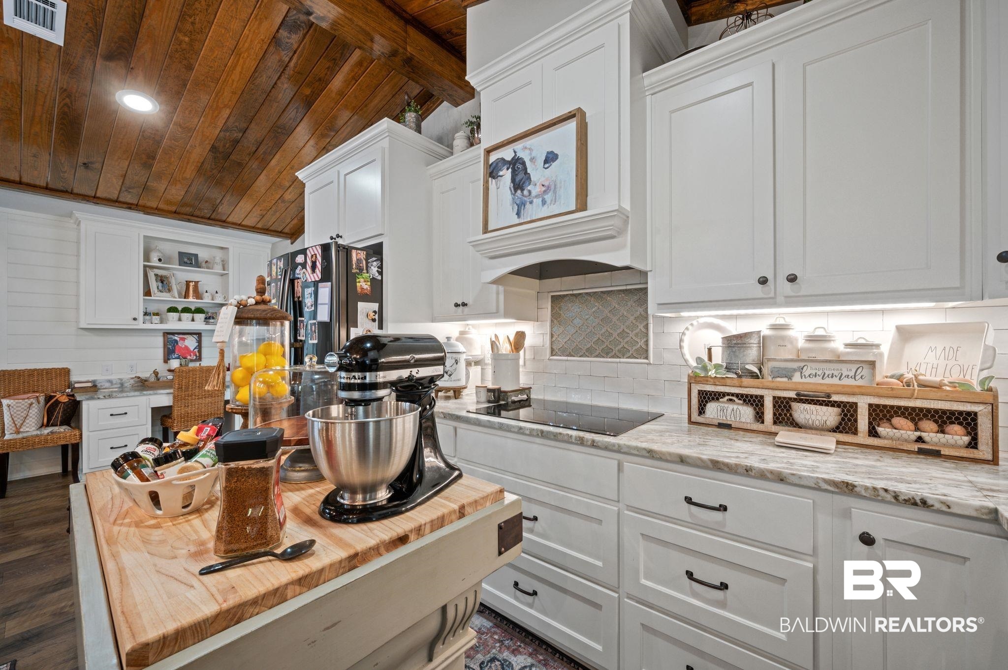 38211-d) V R Byrd Road Bay Minette, AL 36507 - Photo 12 of 58 Kitchen with stainless steel fridge, black electric stovetop, dark hardwood / wood-style flooring, wooden ceiling, and white cabinetry
