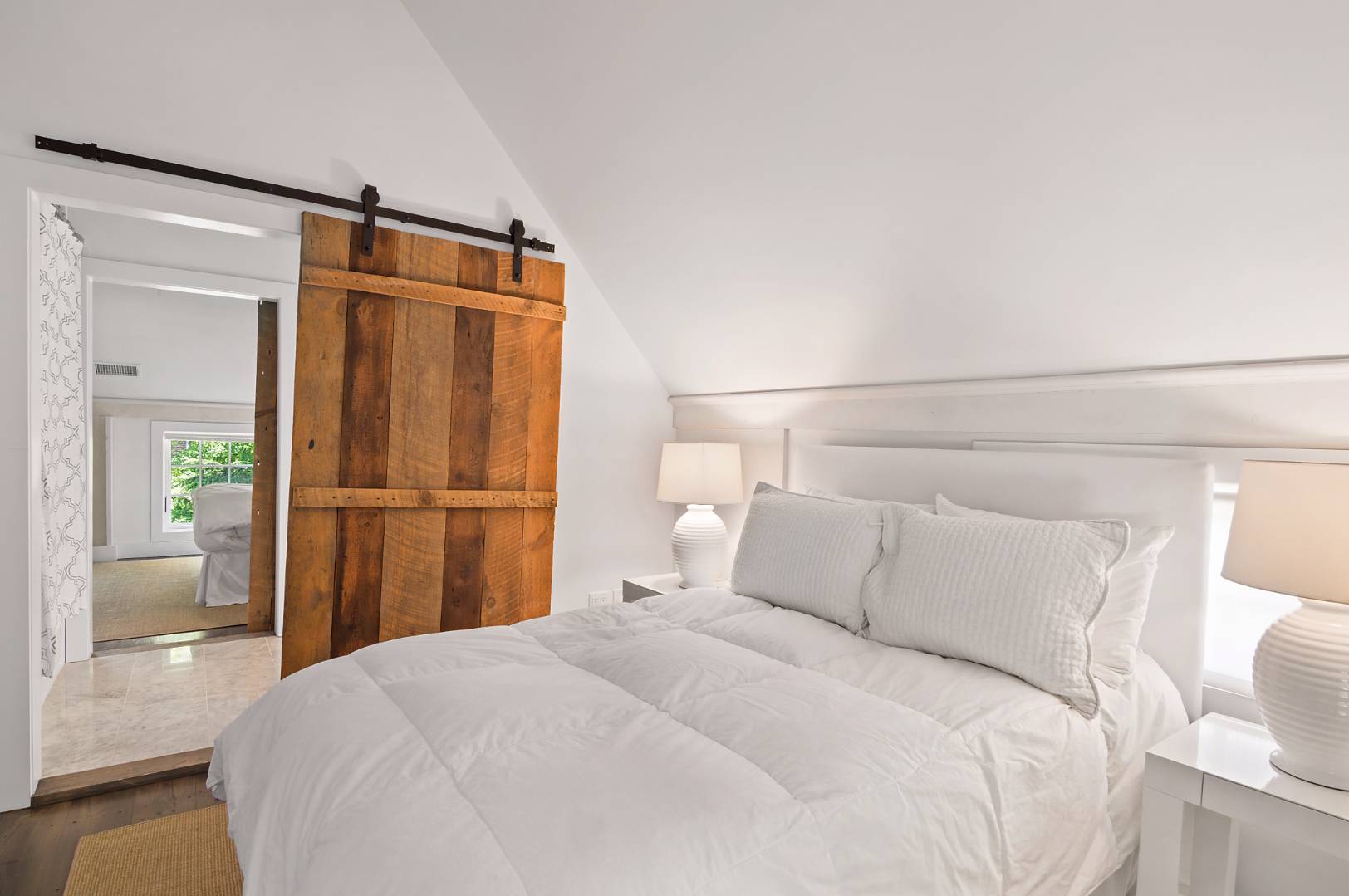 4 Lee Lane Wainscott, NY 11975 - Photo 11 of 14 a bedroom with a bed and closet