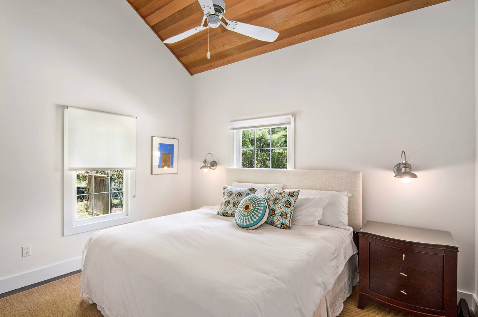 4 Lee Lane Wainscott, NY 11975 - Photo 8 of 14 a bedroom with a bed and a window