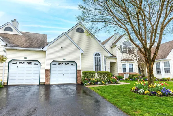 a view of a house with a garden