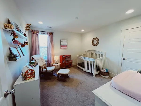 a room with furniture and a window