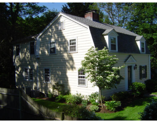 33 Pine Ridge Road Wellesley, MA 02481 - Photo 1 of 27 a view of a white house next to a yard