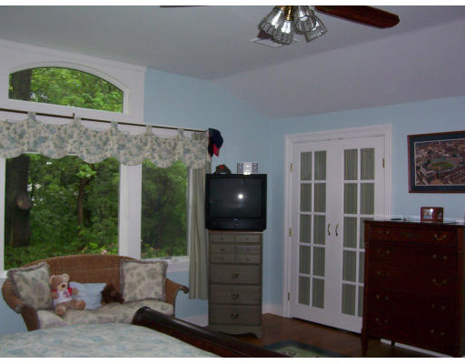 33 Pine Ridge Road Wellesley, MA 02481 - Photo 12 of 27 a living room with furniture and a flat screen tv