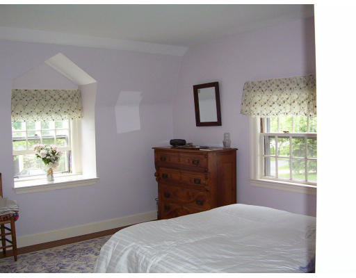 33 Pine Ridge Road Wellesley, MA 02481 - Photo 13 of 27 a bedroom with a bed and a window