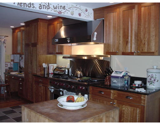 33 Pine Ridge Road Wellesley, MA 02481 - Photo 17 of 27 a kitchen with a sink and cabinets