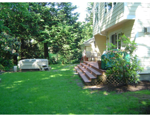 33 Pine Ridge Road Wellesley, MA 02481 - Photo 19 of 27 a view of a backyard with sitting area