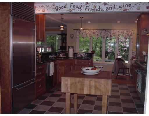 33 Pine Ridge Road Wellesley, MA 02481 - Photo 22 of 27 a view of a dining room with furniture window and outside view