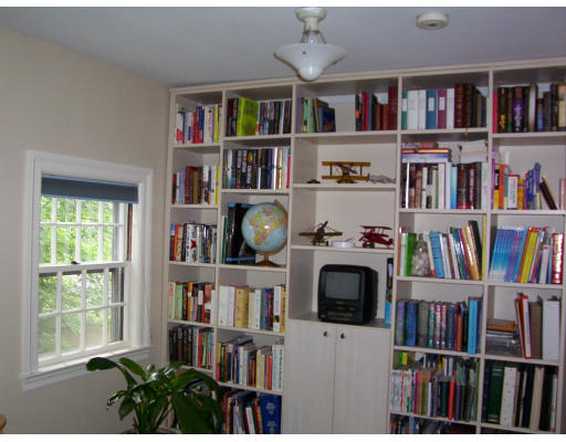 33 Pine Ridge Road Wellesley, MA 02481 - Photo 25 of 27 a living room with lots of books
