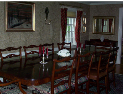 33 Pine Ridge Road Wellesley, MA 02481 - Photo 4 of 27 a view of a dining room with furniture and chandelier