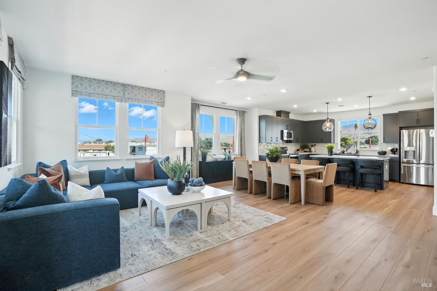 311 Hermes Common Livermore, CA 94551 - Photo 1 of 17 a living room with furniture kitchen view and a wooden floor