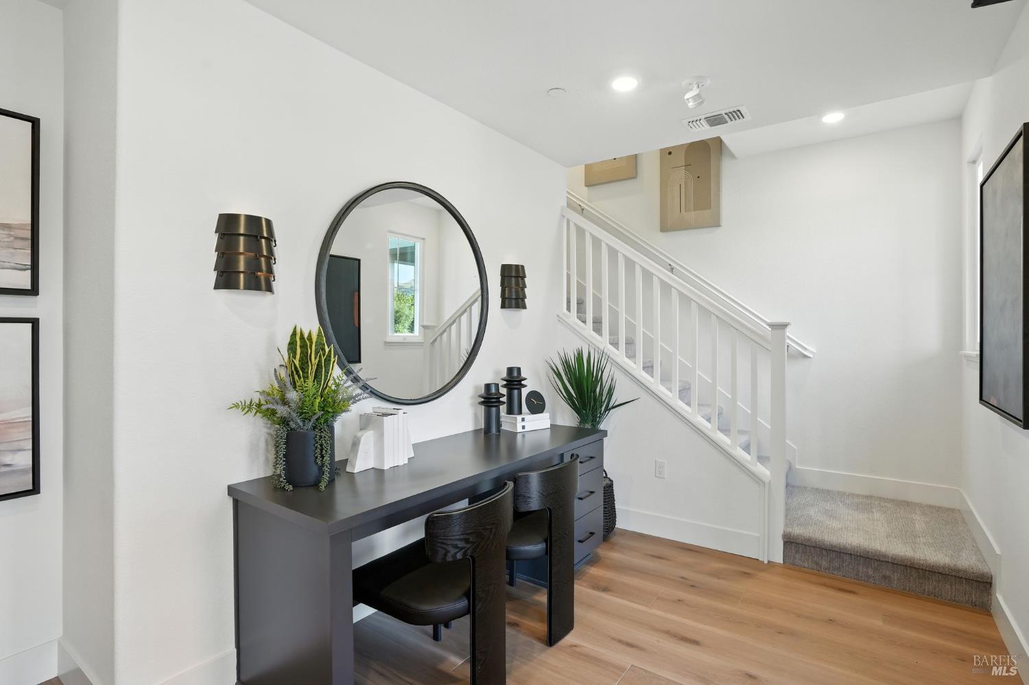 311 Hermes Common Livermore, CA 94551 - Photo 4 of 17 a view of entryway livingroom and hall with wooden floor