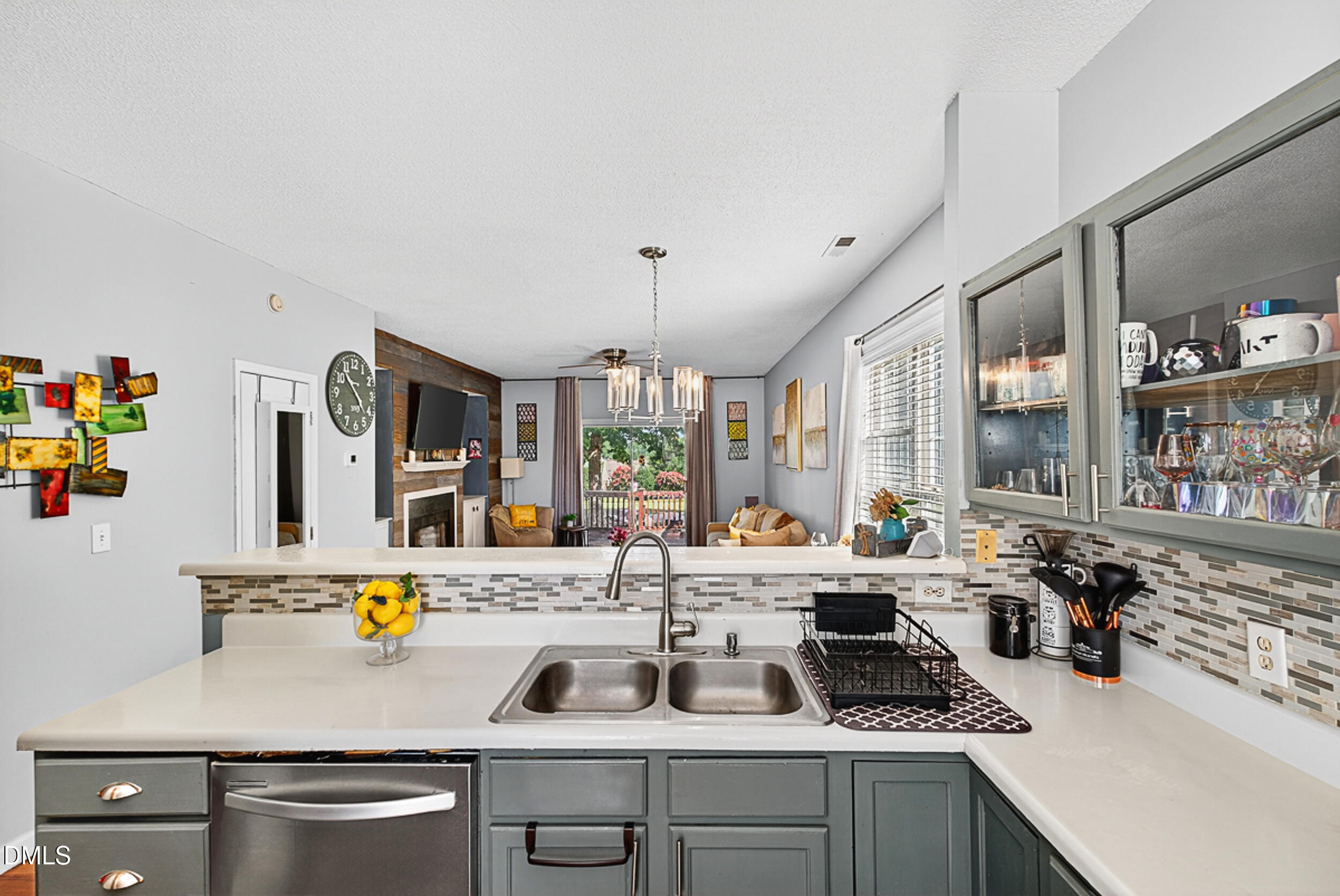 5351 Cog Hill Court Raleigh, NC 27604 - Photo 5 of 15 a kitchen with a sink a stove and cabinets