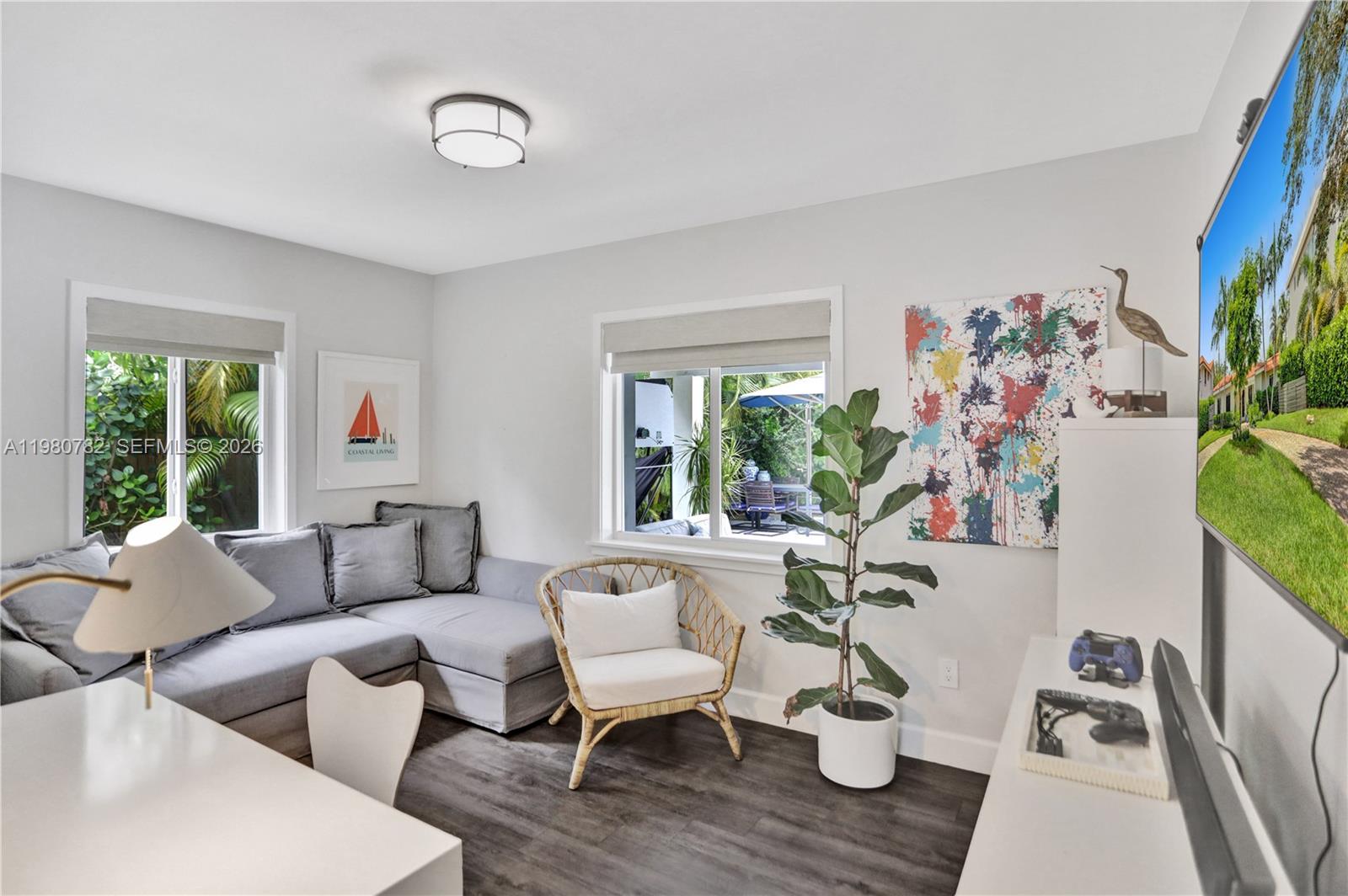 462 Glenridge Road Key Biscayne, FL 33149 - Photo 17 of 32 a living room with furniture and a large window