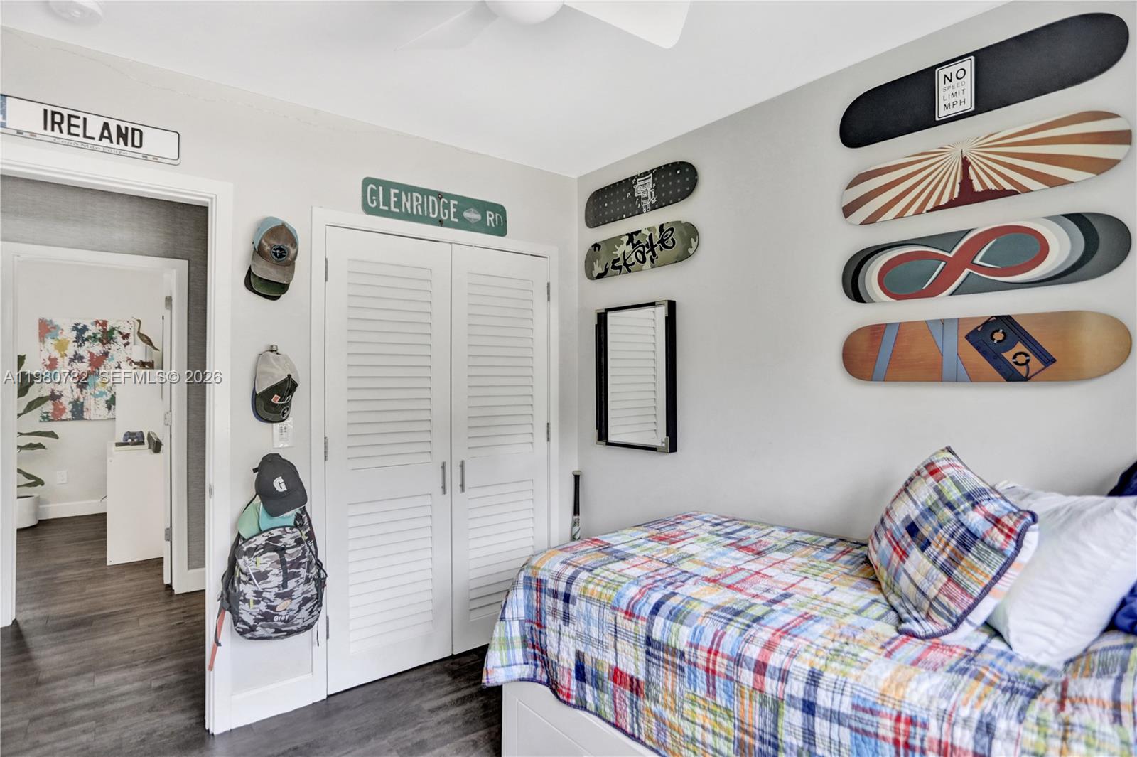 462 Glenridge Road Key Biscayne, FL 33149 - Photo 22 of 32 a bedroom with a bed and a window