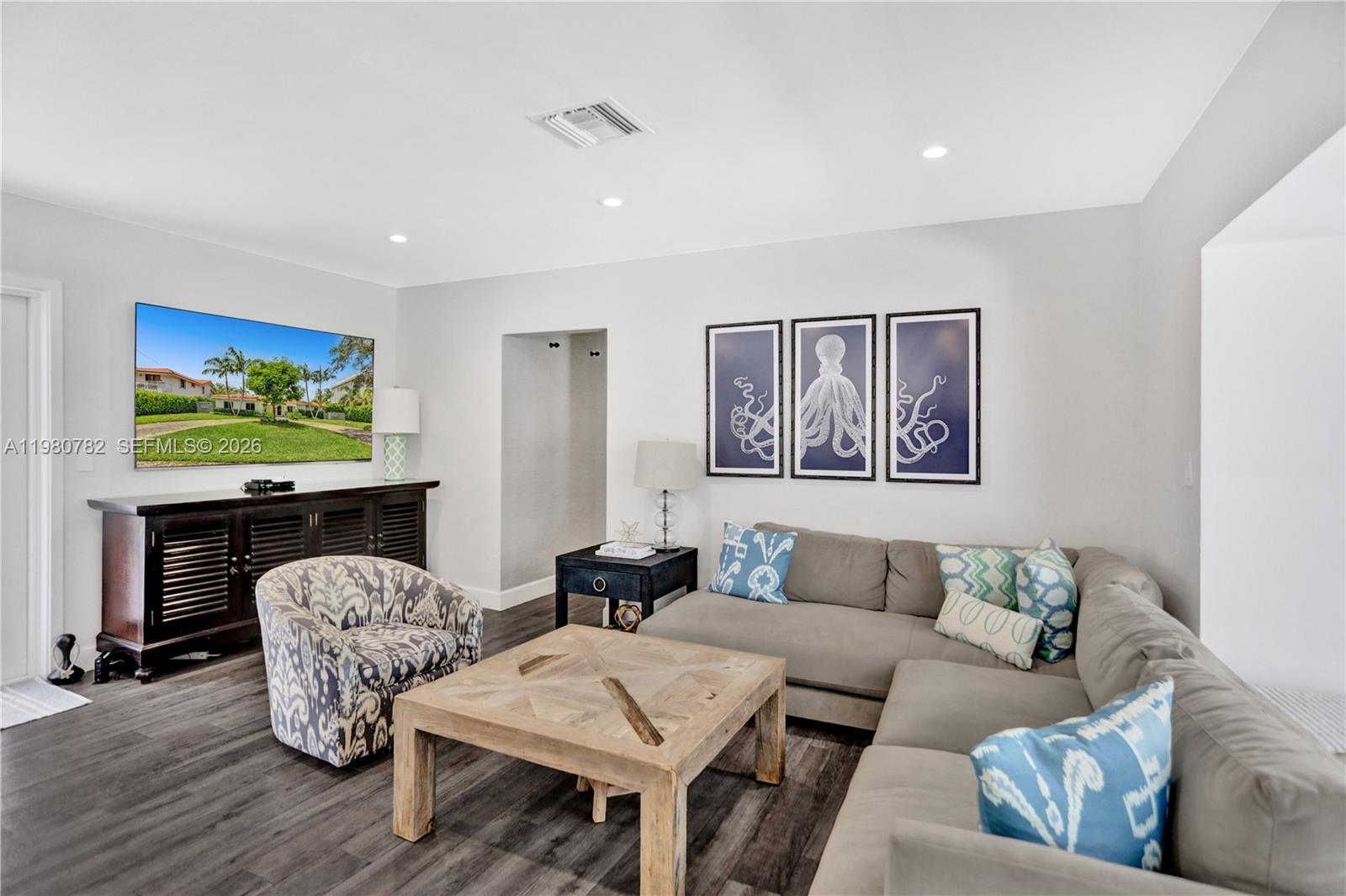 462 Glenridge Road Key Biscayne, FL 33149 - Photo 4 of 32 a living room with furniture and wooden floor