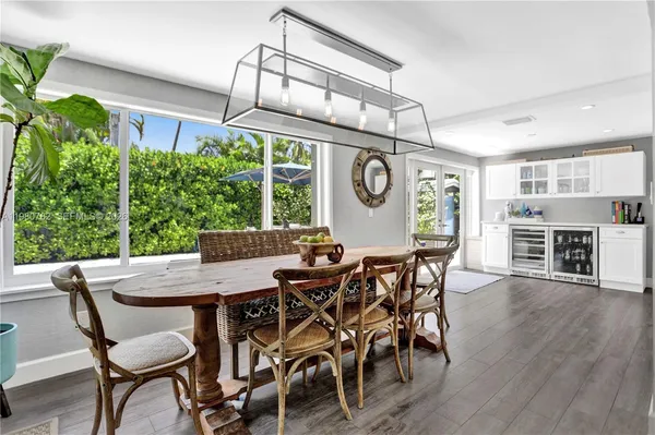 a view of a dining table and chairs in a room